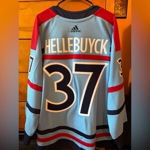 Winnipeg Jets Hellebuyck AUTHENTIC Adidas RCAF Jersey Size 52 (Large)